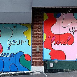 A wall with graffiti.