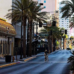 A person riding a bicycle on a street.