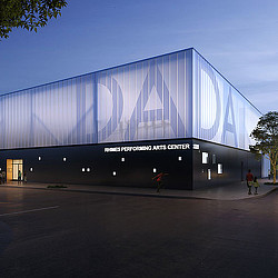 A large building with a large glass wall.