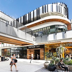 A building with a large glass front.