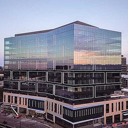 A large building with glass windows.