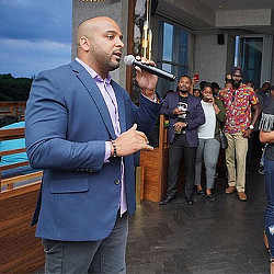 A person holding a microphone.