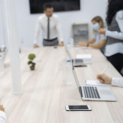 A group of people in a meeting.