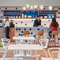 A group of people sitting at a table.