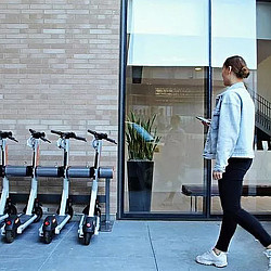 A person walking by a glass door.