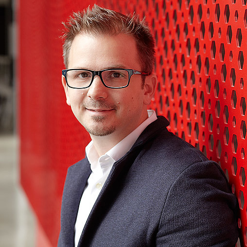 A man wearing glasses.