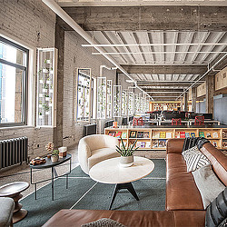 A living room with a bar and couches.