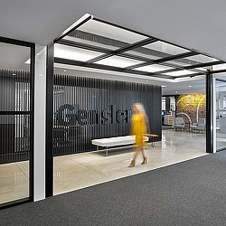 A person walking in a room.