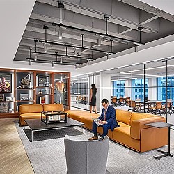 A person sitting on a couch.