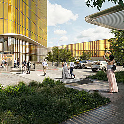 A couple of women in wedding dresses taking a picture of a street.