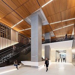 People walking in a large building.