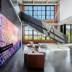 A room with a staircase and a staircase.