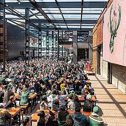 A large group of people sitting in a room.