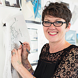 A person holding a pen.