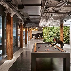 A person playing pool.