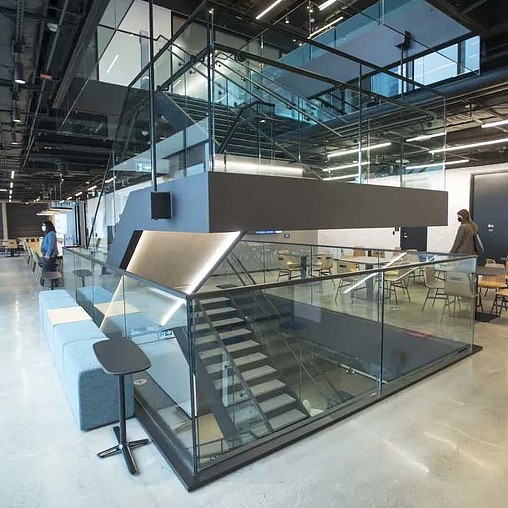 A glass floored office building.