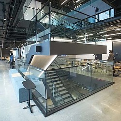 A glass floored office building.