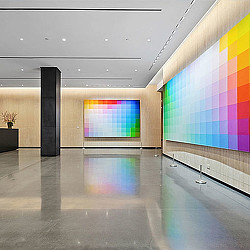 A hallway with a tile floor and a window.