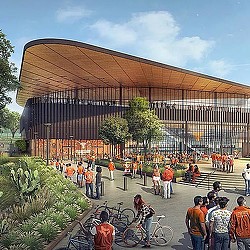 A group of people gather outside a building.