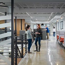 A group of people in a room.