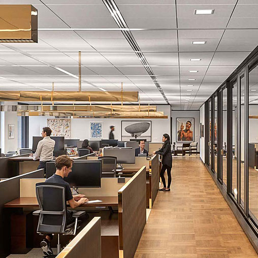 A group of people in an office.