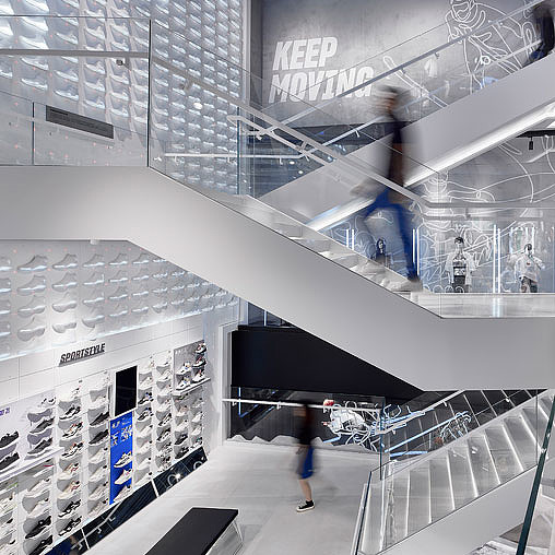 A person walking down a flight of stairs.