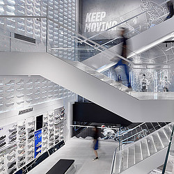 A person walking down a flight of stairs.