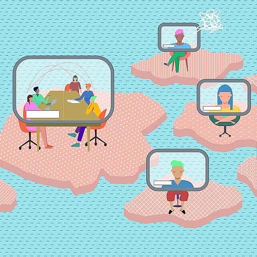 A group of people working in a room.