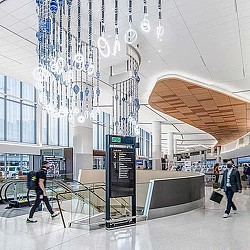 SFO Harvey Milk Terminal 1 interior with light installation.