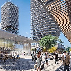 People walking near tall buildings.