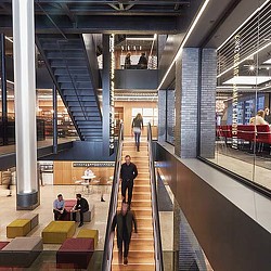 People walking down a flight of stairs.