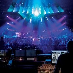 A stage with a crowd of people.