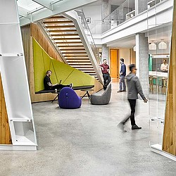 A group of people in a building.