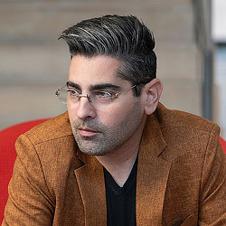 A man wearing glasses.