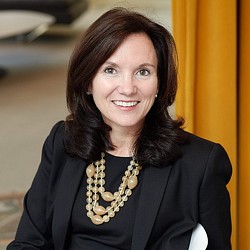 Arlyn Vogelman headshot.