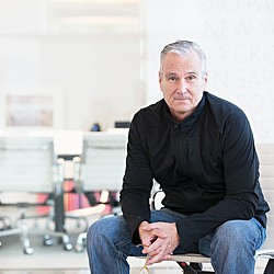 A man sitting on a chair.