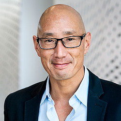 A man wearing glasses.
