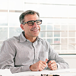 A man wearing glasses.