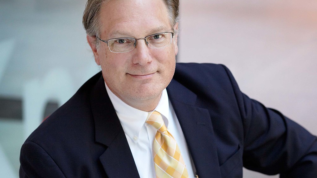 A man wearing a suit and tie.