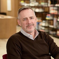 A man smiling for the camera.