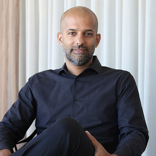 A man sitting in a chair.