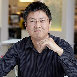 A man with his hand on his chin.