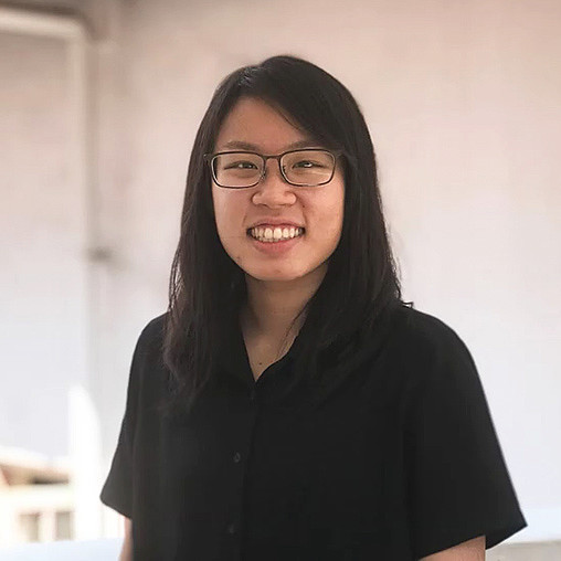 A woman wearing glasses.