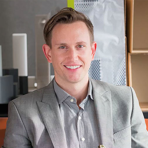 A man smiling for the camera.