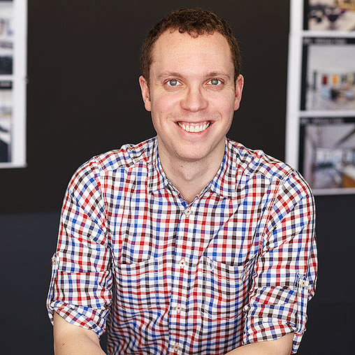 A man smiling for the camera.