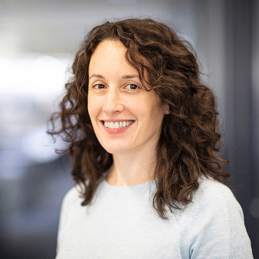 A person with curly hair.