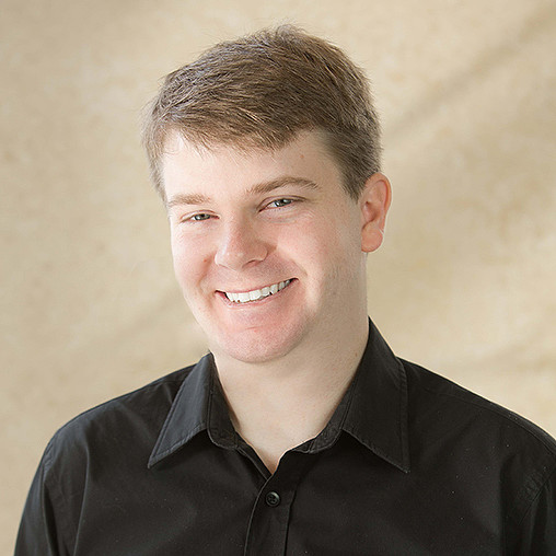 A man smiling for the camera.