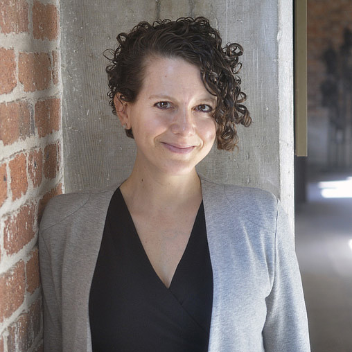 A person smiling for the camera.