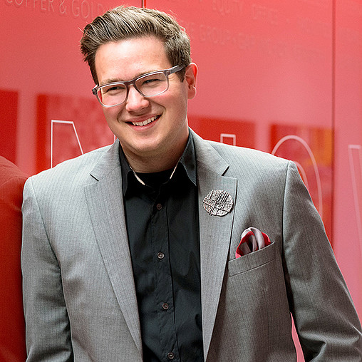 A man wearing glasses.