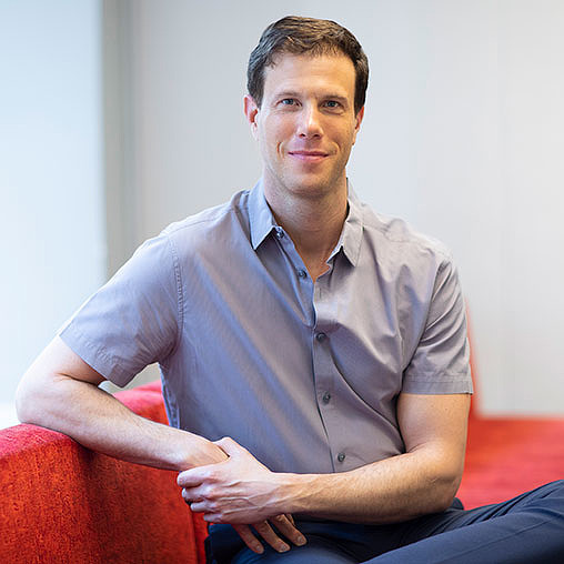 A man sitting on a chair.